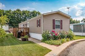 mobile home with large windows and window panes